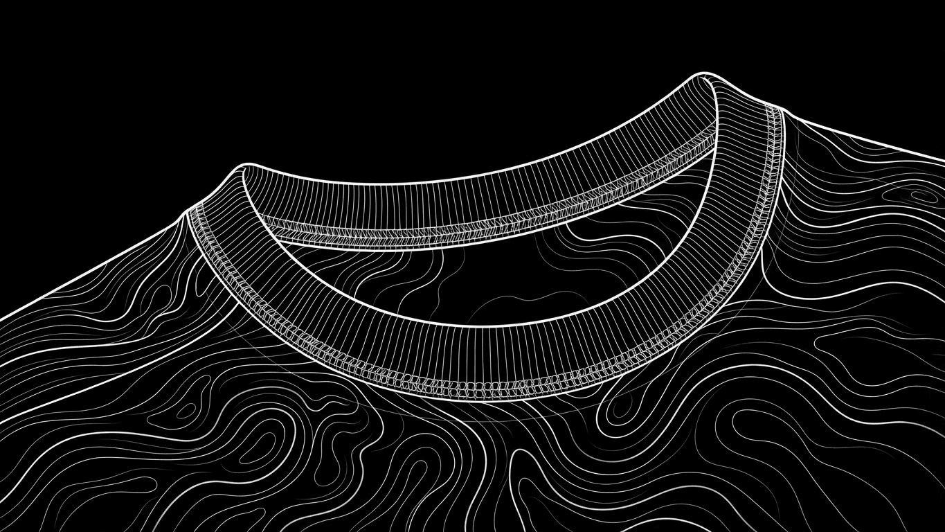 Close-up of a sports crew tee collar showing detailed stitching and fabric texture.